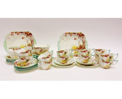 A SHELLEY QUEEN ANNE SHAPE TWELVE SETTING TEA SERVICE,  decorated in the 'Autumn Leaves' pattern, marked to base 'Rd 723404',