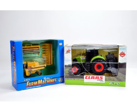 Duo of Farm Toy models from Ertl including New holland combine plus ZAP Claas RC Axion 850 Tractor. E to M in Boxes. (2)