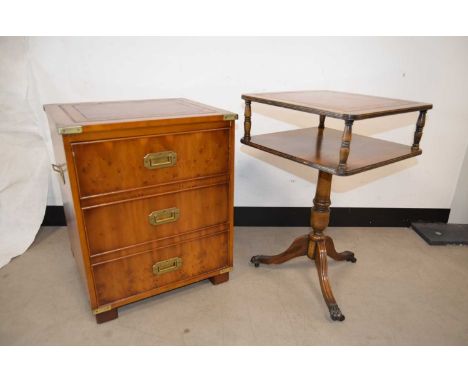 A small brass cornered reproduction ‘campaign’ furniture style cupboard,  the faux drawers opening to racks probably for audi