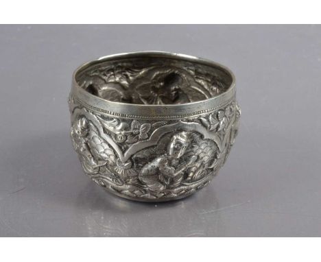 A small Burmese repoussé metalwork 'thabeik' bowl,  late 19th or early 20th Century. decorated with raised and chased figures