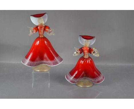 A pair of circa 1960s Venetian Murano Glass 'Dancing Lady' figures, hand-blown ruby red and clear glass with aventurine inclu
