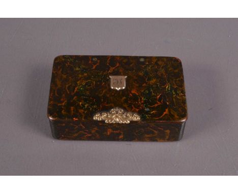 Large 19th Century lacquer snuff box, with gold coloured cartouche and thumbpiece applied to hinged lid. 9cm wide.