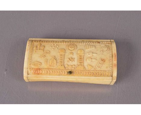 19th century Masonic bone snuff box, with hinged lid with moulded design featuring various Masonic symbols. 9cm wide.