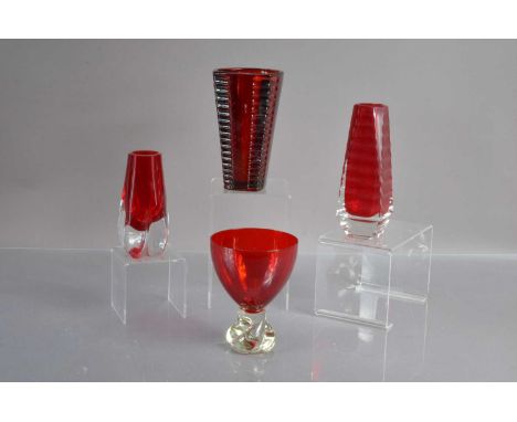 A group of four mid-century modern ruby red art glass items,  including a small 1970's Whitefriars FLC5 lobed cased glass vas