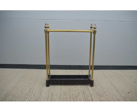 A lacquered brass and cast iron stick/umbrella stand, 15cm deep 45cm wide 60cm high