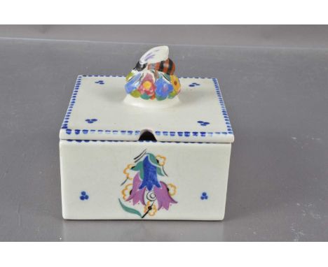 An early Poole pottery '941' shape honey comb box,  with bee on flower finial. Impressed 'Poole England' mark with incised '9