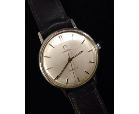 Omega - a Deville wrist watch, textured dial, baton markers, centre seconds, stainless steel case, manual wind movement, late