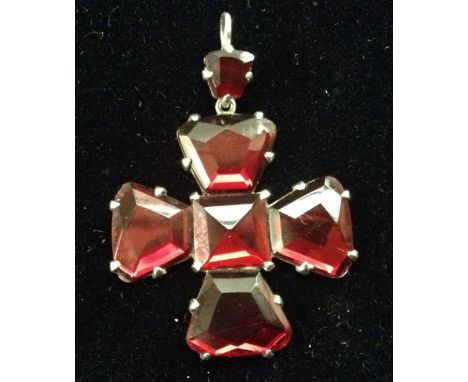 A burgundy red Vauxhall glass Maltese cross pendant, unmarked silver mount and suspension loop, unmarked, 4cm high