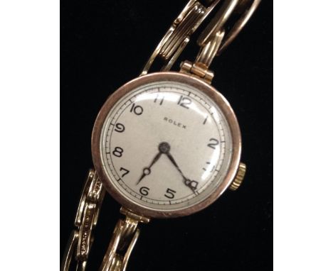 Rolex - A 1930's lady's 9ct gold cased circular wrist watch, silvered dial, Arabic numerals, minute track, manual wind fiftee