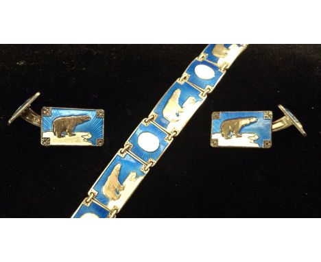 An Einar Modahl of Oslo Norwegian silver and enamelled bracelet, the eleven panel bracelet decorated with white Polar Bears a