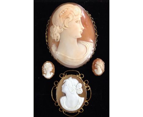 A Victorian shell cameo brooch, head and shoulder portrait lady facing right, 9ct gold frame, 52mm x 44mm;  another smaller f