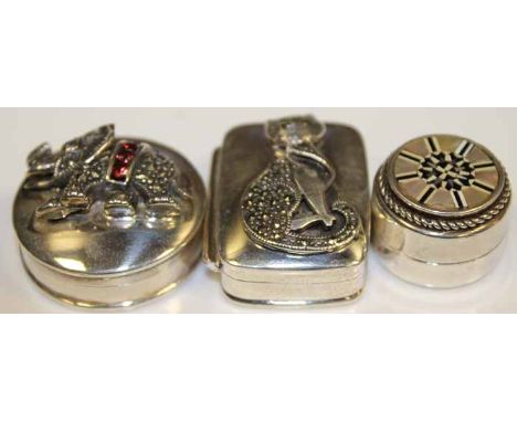 THREE SILVER TRINKET BOXES
including a cat with marcazite, elephant with brown gem and mother of pearl inlaid examples, one h