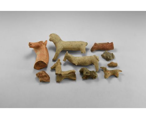 1st millennium AD. A mixed group of ceramic animal figures including horse, lion and panther.  1 kg total, 3.5-15cm (1 1/2 - 