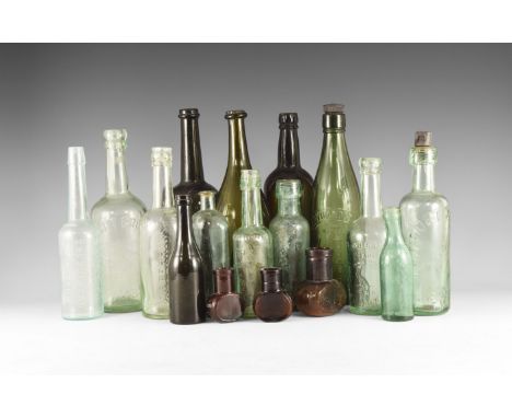 Late 19th century AD. A mixed group comprising: an aqua beer bottle marked 'Hewitt Bros. Ltd. / Registered / Trade Mark / Gri