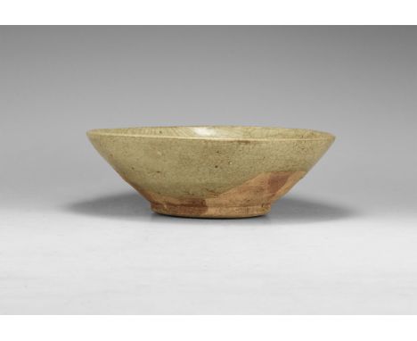 Ming Dynasty, 1368-1644 AD. A conical ceramic bowl with basal ring, green glaze to upper body.  313 grams, 16cm (6 1/4"). Pro