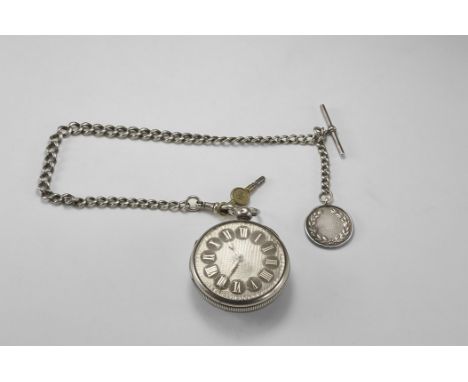 Case hallmarked 1925.. A silver pocket watch with domed glass front cover, radiating hatching to the rear cover, ribbed circu