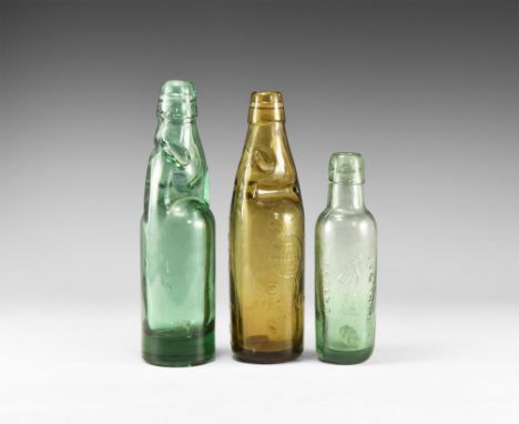 Late 19th century AD. A mixed group comprising: an aqua Codd 6 oz. bottle marked ' Lamonts Patent' with logo of a hand holdin