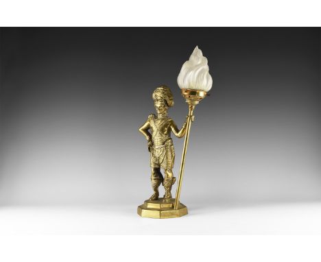 20th century AD. A brass table lamp with Highland Regiment kilted soldier supporting a glass-topped torch, hollow to the reve
