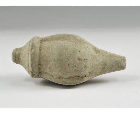 9th-11th century AD. A hollow ceramic biconical vessel decorated with thick conical nozzle; to the shoulders and body lozengi