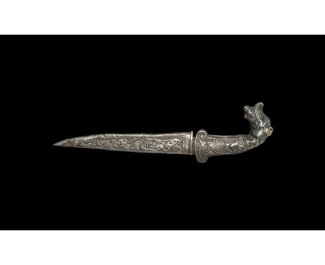 Late 19th-early 20th century AD. A narrow single-edged blade with curved tip, engraved ram's head to one face and to the othe