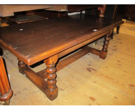 Good quality reproduction oak rectangular coffee table on bobbin turned supports, 48ins x 24ins