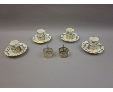 Part set of Aynsley coffee cups and saucers with silver holders comprising:  six holders, four cups and four saucers (one cup