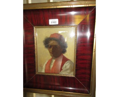 Late 19th Century oil on canvas loosely laid on card, portrait of a Moroccan boy, monogrammed, 8.5ins x 7ins CONDITION REPORT
