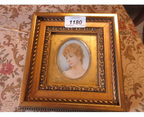 19th Century oval mounted miniature portrait of a young lady, gilt framed