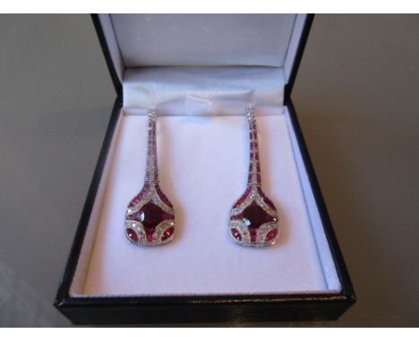 Pair of platinum Art Deco style ruby and diamond drop earrings, the rubies of approximately 4.5ct total, diamonds of approxim