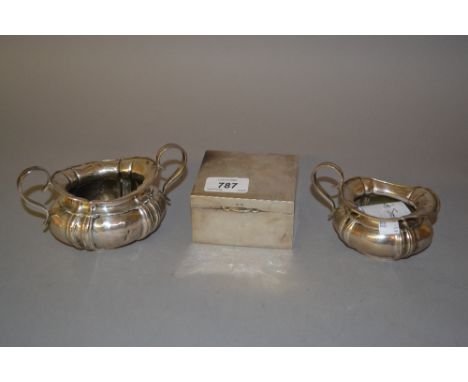 Birmingham silver cigarette box together with a silver cream jug and matching sugar basin