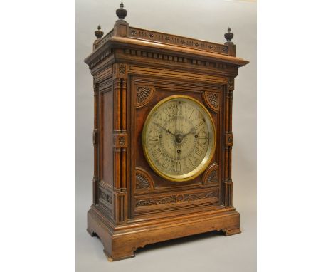 Hunt and Roskell, good quality Aesthetic movement rosewood and amboyna bracket clock, the galleried top above a silvered dial