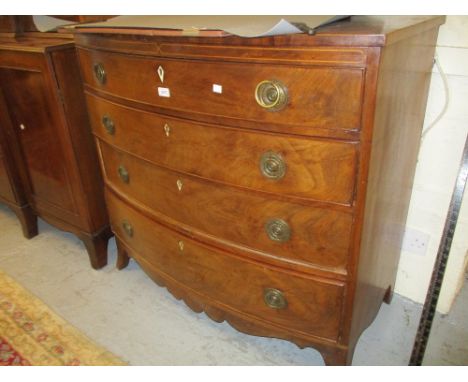 Regency mahogany and line inlaid bow front chest of four graduated drawers with brass swing handles and splay bracket feet, 4