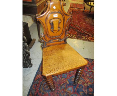 Victorian carved oak hall chair and a Victorian white painted three shelf wall bracket