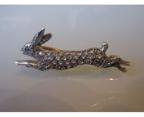 Diamond and ruby set running hare brooch