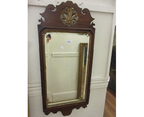Mahogany and parcel gilt wall mirror in 18th Century style, together with a gilt two light wall bracket
