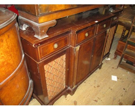 Reproduction mahogany Regency style breakfront sideboard, having four short drawers with two panelled central doors flanked b