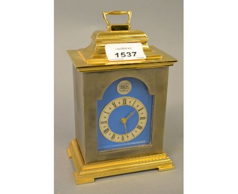 Thwaites and Reed, small silvered and gilt brass bracket clock with original mahogany bracket