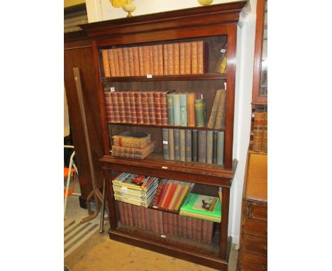 19th Century mahogany bookcase having moulded cornice above three open adjustable shelves, the base with single adjustable sh