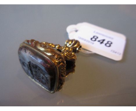 Good quality 19th Century yellow metal fob seal inset with intaglio crest CONDITION REPORT Two condition issues as shown in p