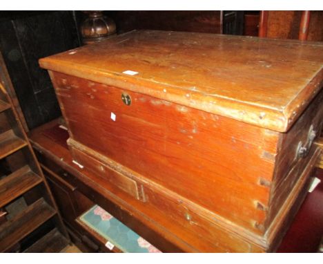 19th Century stripped pine trunk with hinged cover above a plinth base, 31.5ins wide