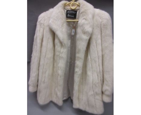 Ladies white fur half length fur coat by Grosvenor exclusive to Harrods, together with a ladies grey fur half length coat CON