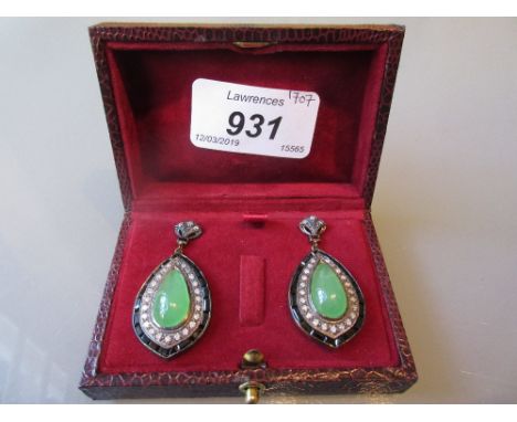 Pair of cabochon, jade, onyx and diamond set drop earrings in a red leatherette box