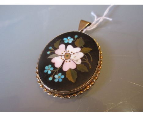 19th Century yellow metal and pietra dura pendant of oval floral design CONDITION REPORT Some light scratching to the stone b