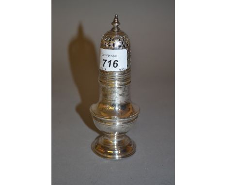 George II silver baluster form spice pot, the pierced dome lid with turned finial, a plain body with traces of original engra