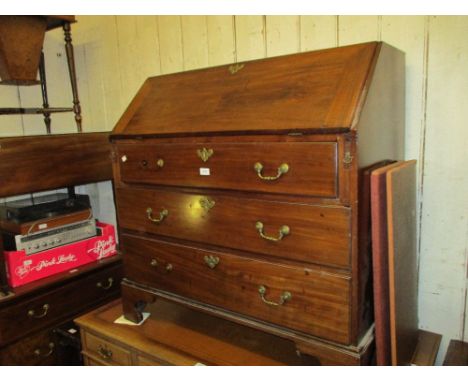 George III mahogany bureau, the fall front enclosing a fitted interior above three graduated drawers with brass handles and e