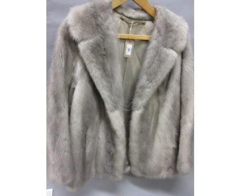 Ladies grey coloured half length fur coat and a mink fur stole CONDITION REPORT 20ins under arm to under armIn good condition