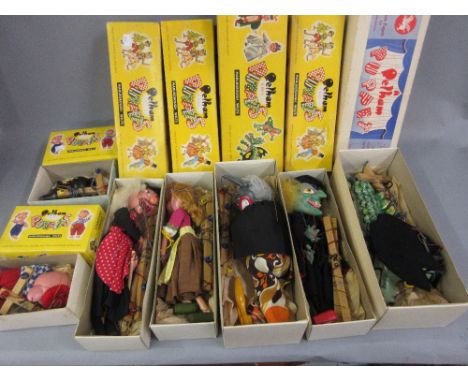 Pelham puppet in blue and white box, ' Mother Dragon ' together with six other various Pelham puppets in yellow boxes CONDITI