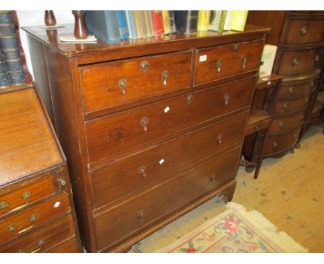 18th Century oak straight front chest of two short and three long graduated drawers with drop handles raised on bracket feet