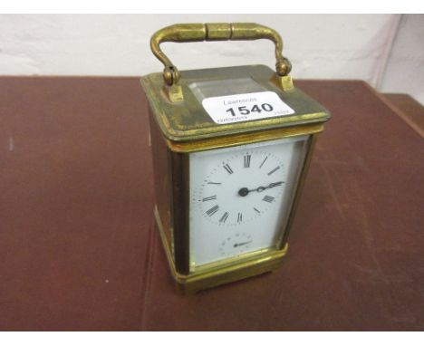 French gilt brass carriage clock, the enamel dial with Roman numerals and subsidiary alarm (movement at fault)