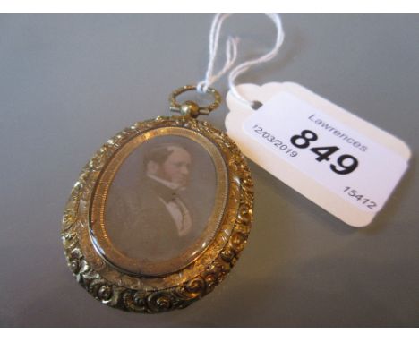 Early Victorian oval gilt metal pendant locket inset with a double sided portrait, Daguerrotype
